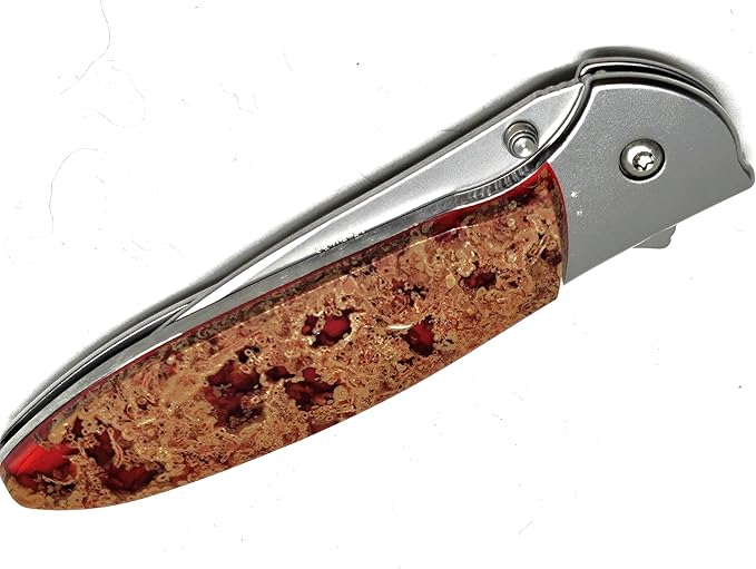 Hot Springs Red folding knife on a Ken Onion Designed 1660 plain blade.