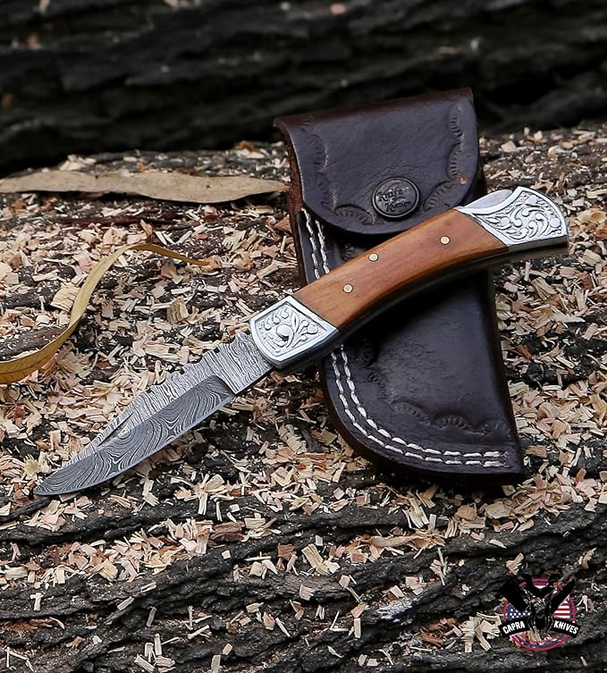 Capra Knives CK-52 Handcrafted Folding Engraved Brass Pocket Knife 4” Folded, 7.25” Long Overall, 4.5oz Olive Wood Handle, Damascus Blade with Leather Sheath