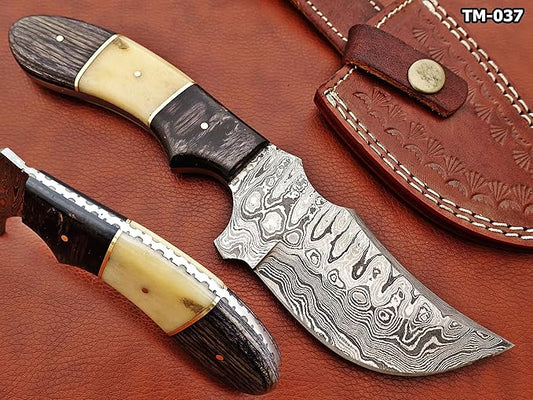 9.5" Long full tang blade skinning Knife, Rain drop pattern trailing point blade, hand forged Damascus steel, 2 tone black wood and Camel bone scale, Cow Leather sheath