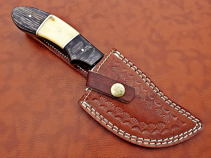 9.5" Long full tang blade skinning Knife, Rain drop pattern trailing point blade, hand forged Damascus steel, 2 tone black wood and Camel bone scale, Cow Leather sheath