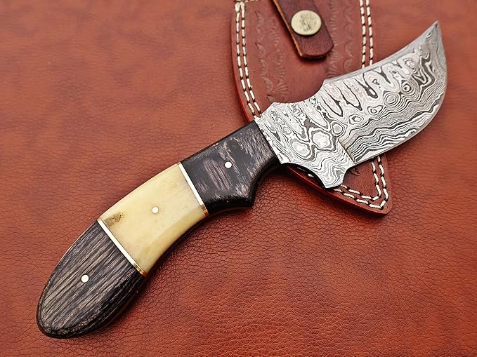9.5" Long full tang blade skinning Knife, Rain drop pattern trailing point blade, hand forged Damascus steel, 2 tone black wood and Camel bone scale, Cow Leather sheath