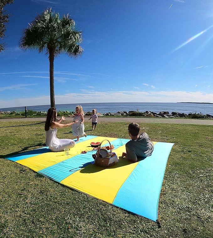 Premium XXL Beach Blanket Sandproof Water Resistant Quick Dry Mat 10ft by 9ft for 1-8 Adults with 4 Metal Stakes, 4 Corner Pockets, Secure Clip and Strap, and Attached Bag