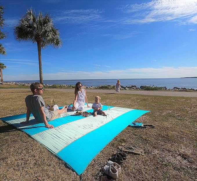 Premium XXL Beach Blanket Sandproof Water Resistant Quick Dry Mat 10ft by 9ft for 1-8 Adults with 4 Metal Stakes, 4 Corner Pockets, Secure Clip and Strap, and Attached Bag