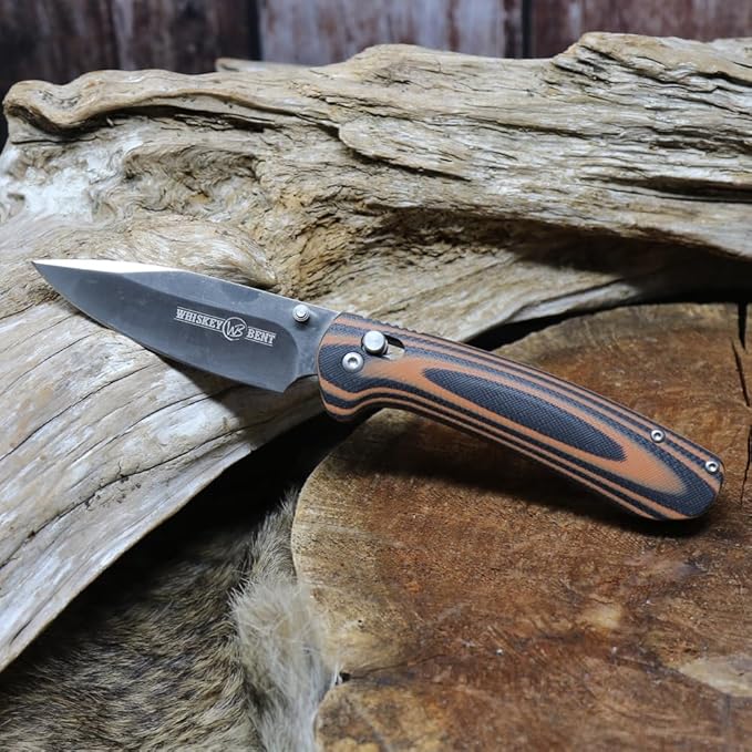WHISKEY BENT HAT CO. Catch Pin Lock Folding Pocket Knife w/Clip Drop Point Blade Thumbstud Opening 440C Stainless Steel (Chaps, 4.5" - Closed Length)