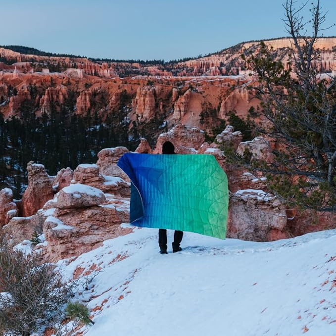 Rumpl The NanoLoft Puffy Blanket | Indoor Outdoor Camping Blanket for Traveling, Picnics, Beach Trips, Concerts | 52" x 75" | Patch Fade Cool, 1-Person