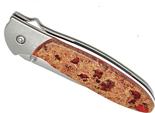 Hot Springs Red folding knife on a Ken Onion Designed 1660 plain blade.