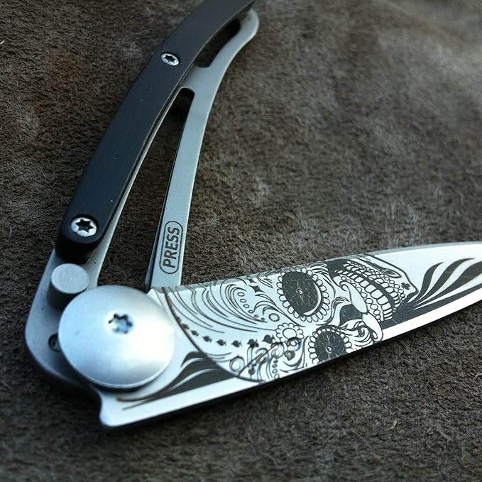 deejo - Ultra-lightweight folding pocket knife with clip belt - Ebony version 1.3 oz - Thin blade and sharp - Latino Skull Design - Steel stainless steel - Elegant and modern design