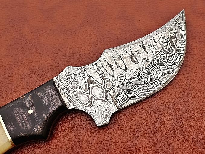 9.5" Long full tang blade skinning Knife, Rain drop pattern trailing point blade, hand forged Damascus steel, 2 tone black wood and Camel bone scale, Cow Leather sheath