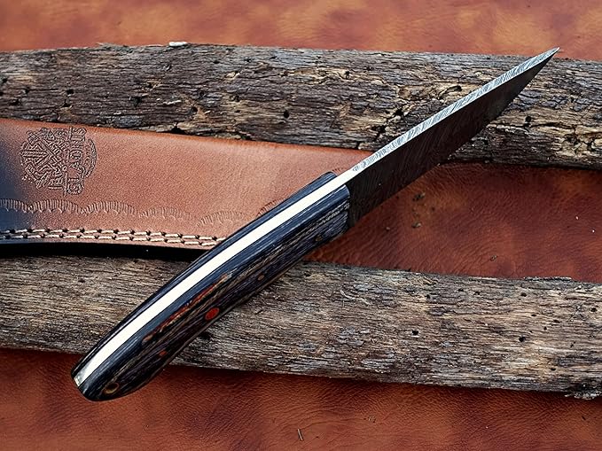| Viking Heritage Skinner Knife – Expertly Crafted with Damascus steel for Precision Hunting and Field Dressing: Embrace the Timeless Elegance of Craftsmanship with this Razor-Sharp