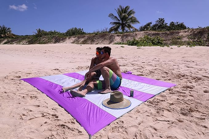 Premium XXL Beach Blanket Sandproof Water Resistant Quick Dry Mat 10ft by 9ft for 1-8 Adults with 4 Metal Stakes, 4 Corner Pockets, Secure Clip and Strap, and Attached Bag