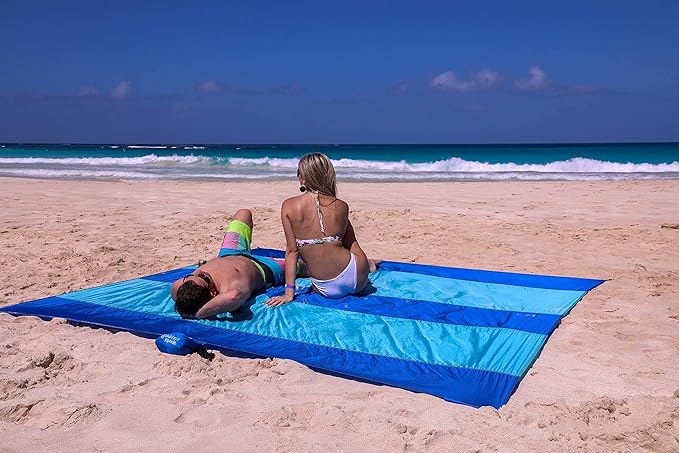 Premium XXL Beach Blanket Sandproof Water Resistant Quick Dry Mat 10ft by 9ft for 1-8 Adults with 4 Metal Stakes, 4 Corner Pockets, Secure Clip and Strap, and Attached Bag