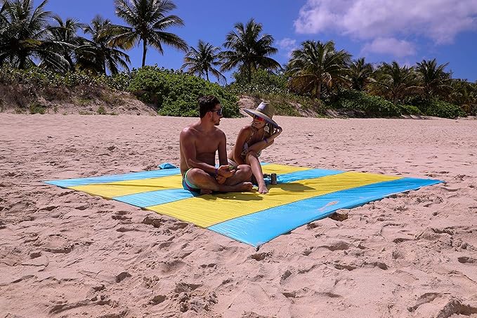 Premium XXL Beach Blanket Sandproof Water Resistant Quick Dry Mat 10ft by 9ft for 1-8 Adults with 4 Metal Stakes, 4 Corner Pockets, Secure Clip and Strap, and Attached Bag